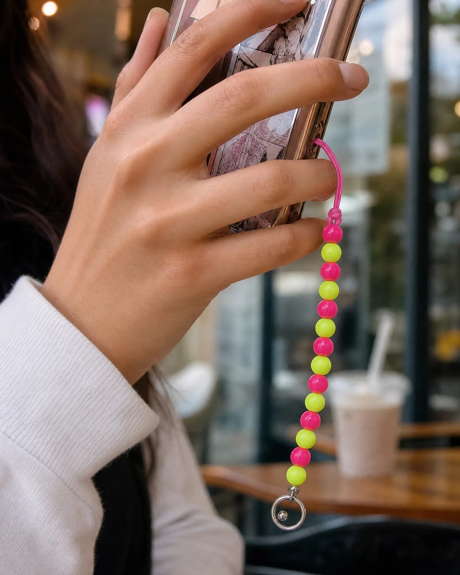 Beaded Phone Charm — Rani/Lime — on model